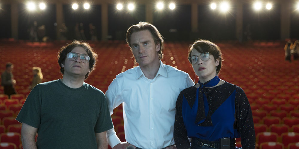 This photo provided by Universal Pictures shows, Michael Stuhlbarg, from left, as Andy Hertzfeld, Michael Fassbender as Steve Jobs, and Kate Winslet as Joanna Hoffman, in a scene from the film, "Jobs." (Francois Duhamel/Universal Pictures via AP) ORG XMIT: CAET760
