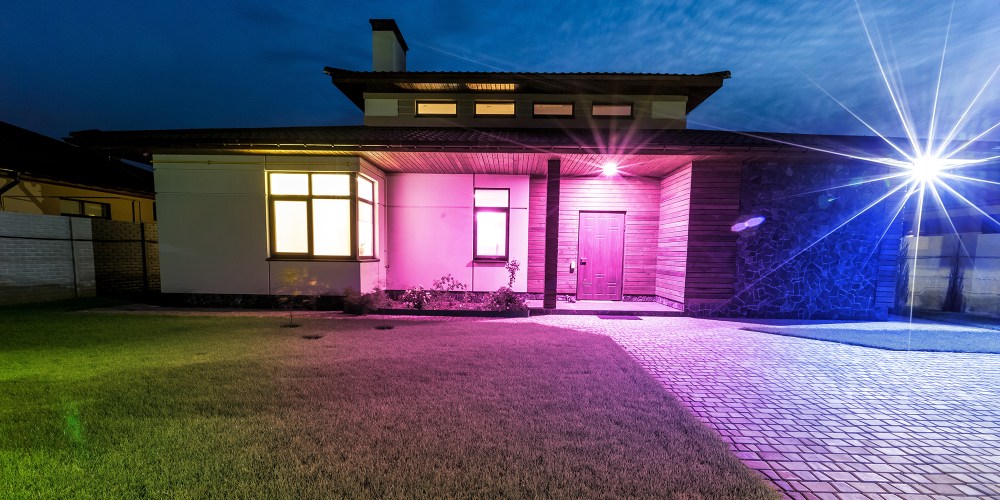 Detached luxury house at night - view from outside front entrance. Architecture modern design, beautiful house, night scene