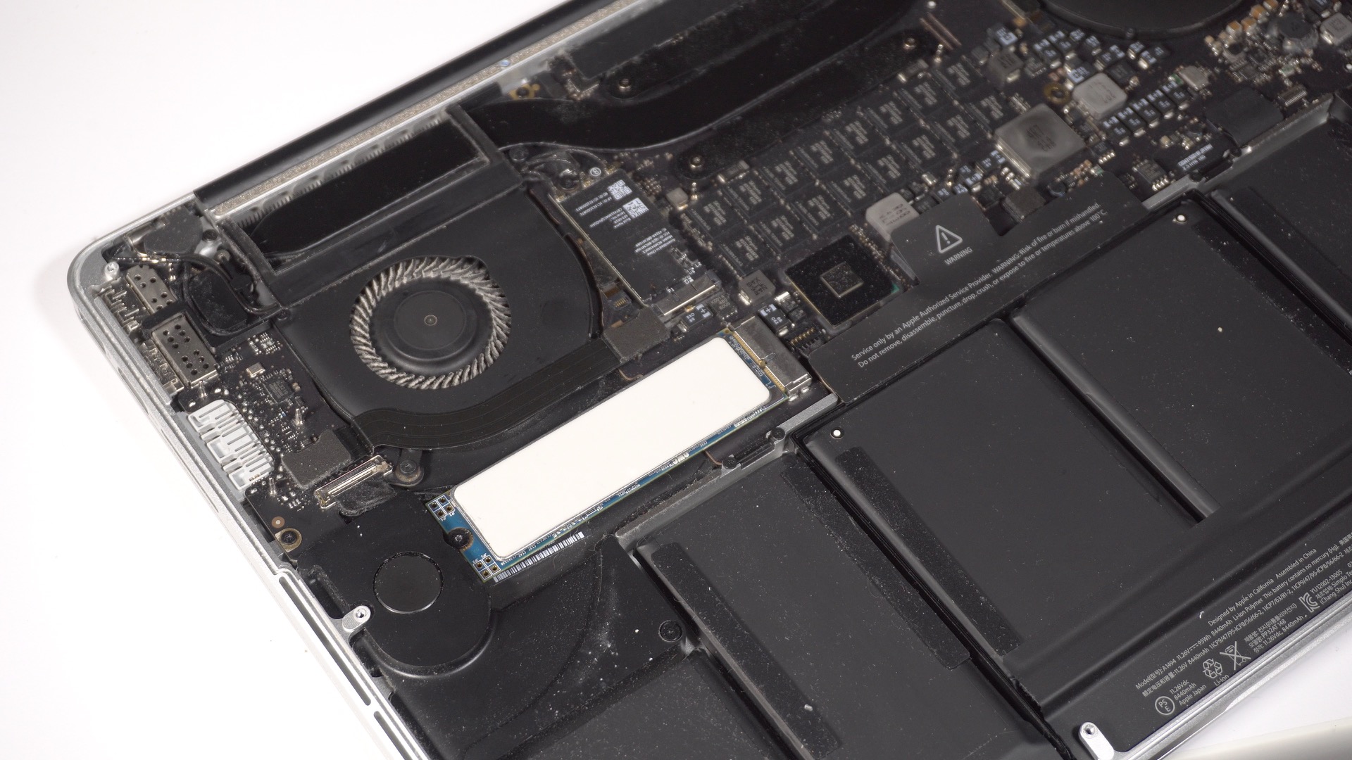 MacBook Pro with Retina Display back cover battery exposed