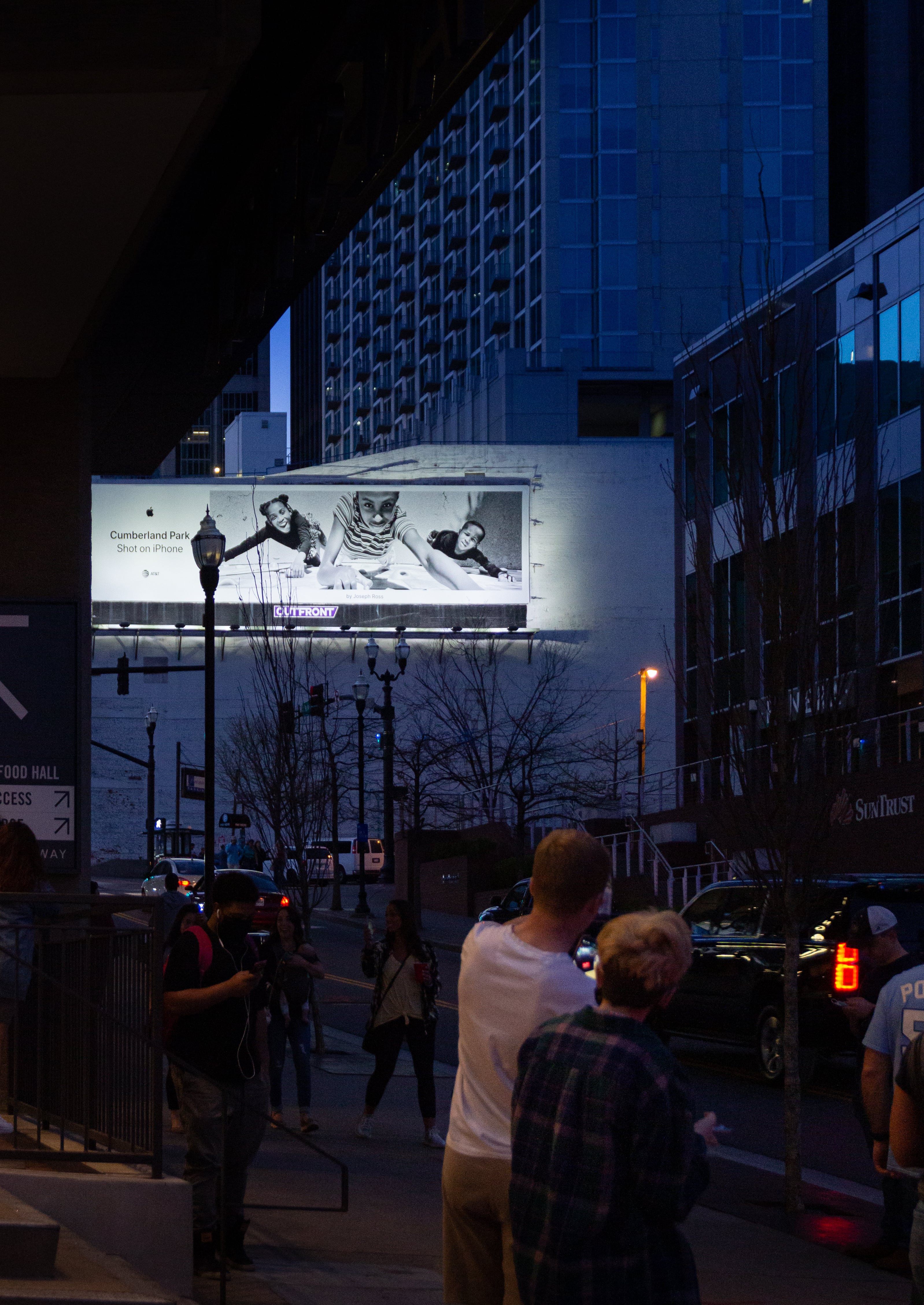 A Shot on iPhone billboard next to Apple Downtown Nashville