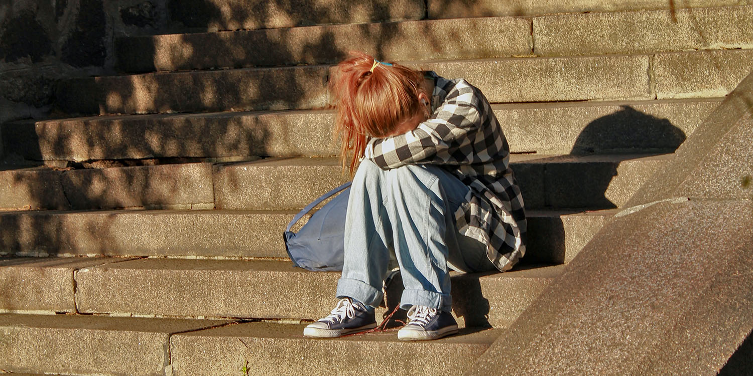Teen girls mental health | Sad girl on steps